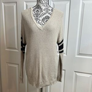 Beige V-Neck Sweater with Black Stripes